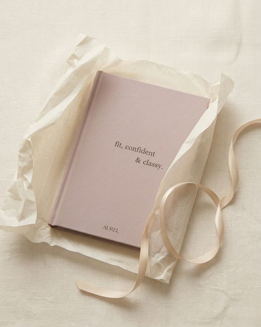 An AUREL journal styled on a warm surface